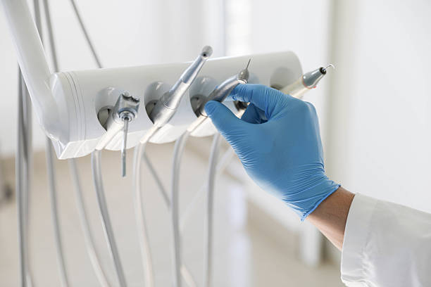 Professional Tooth Extraction technician working in Columbia, IL